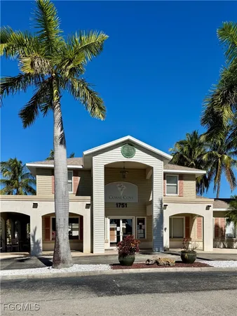 a front view of a building with street view