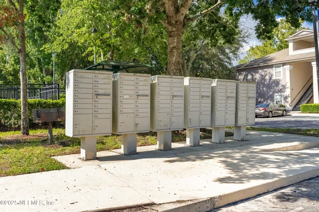 a backyard of a house with outdoor seating