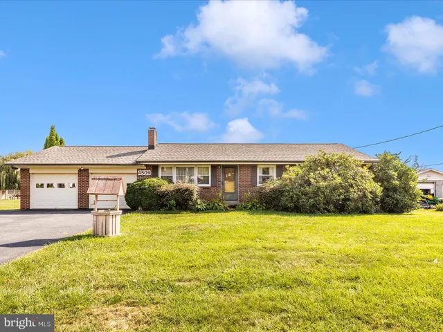 a view of a house with a big yard