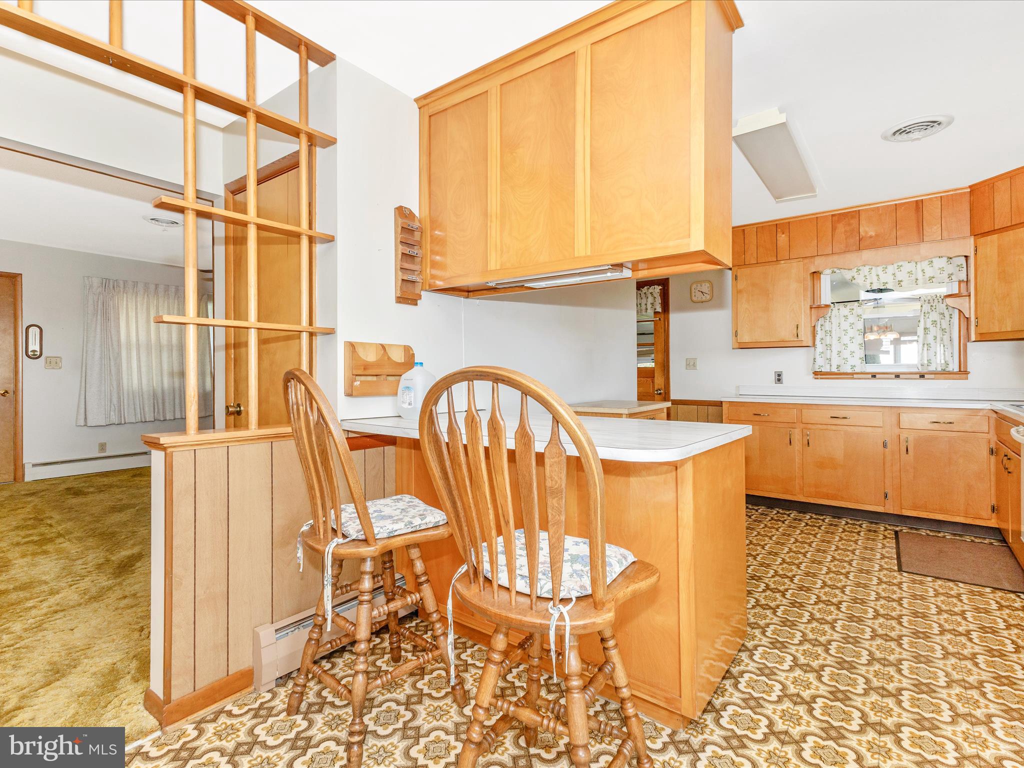 4509 Valley View Road Middletown, MD 21769 - Photo 12 of 51 a view of a kitchen with a dining table chairs and entryway