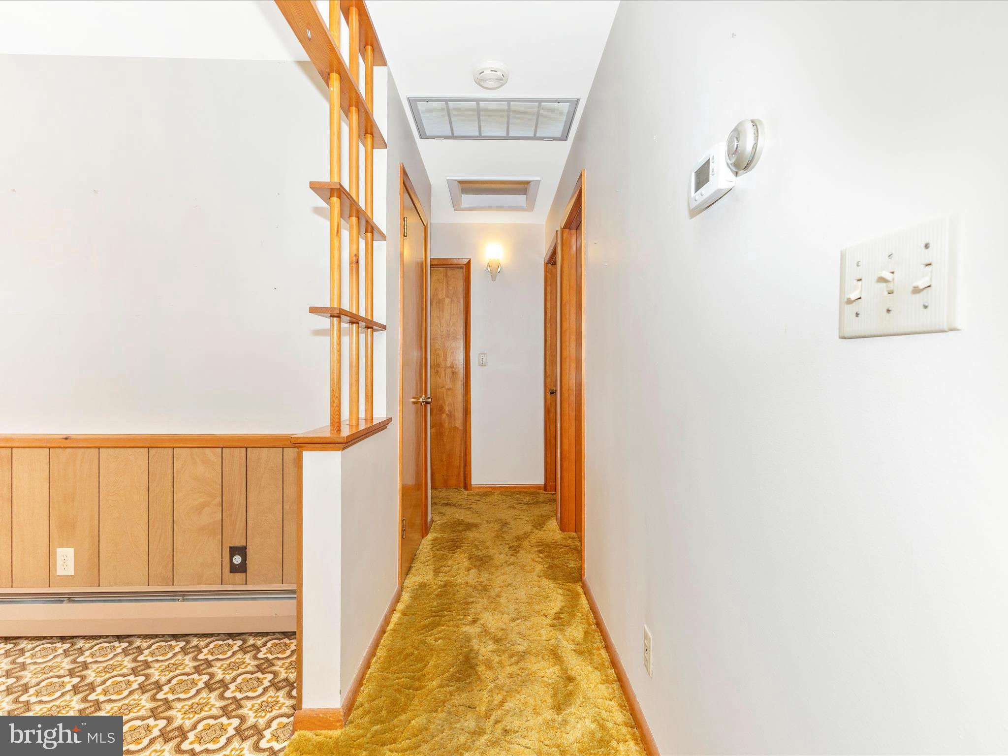 4509 Valley View Road Middletown, MD 21769 - Photo 15 of 51 a view of a hallway with wooden floor