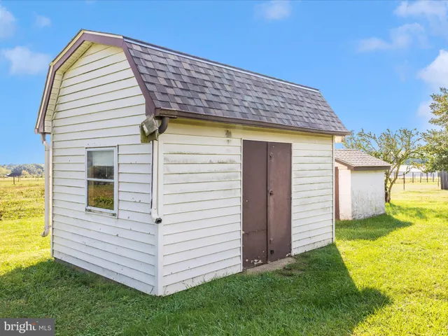 a view of a house with a swimming pool