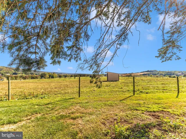 a view of ocean with residential houses