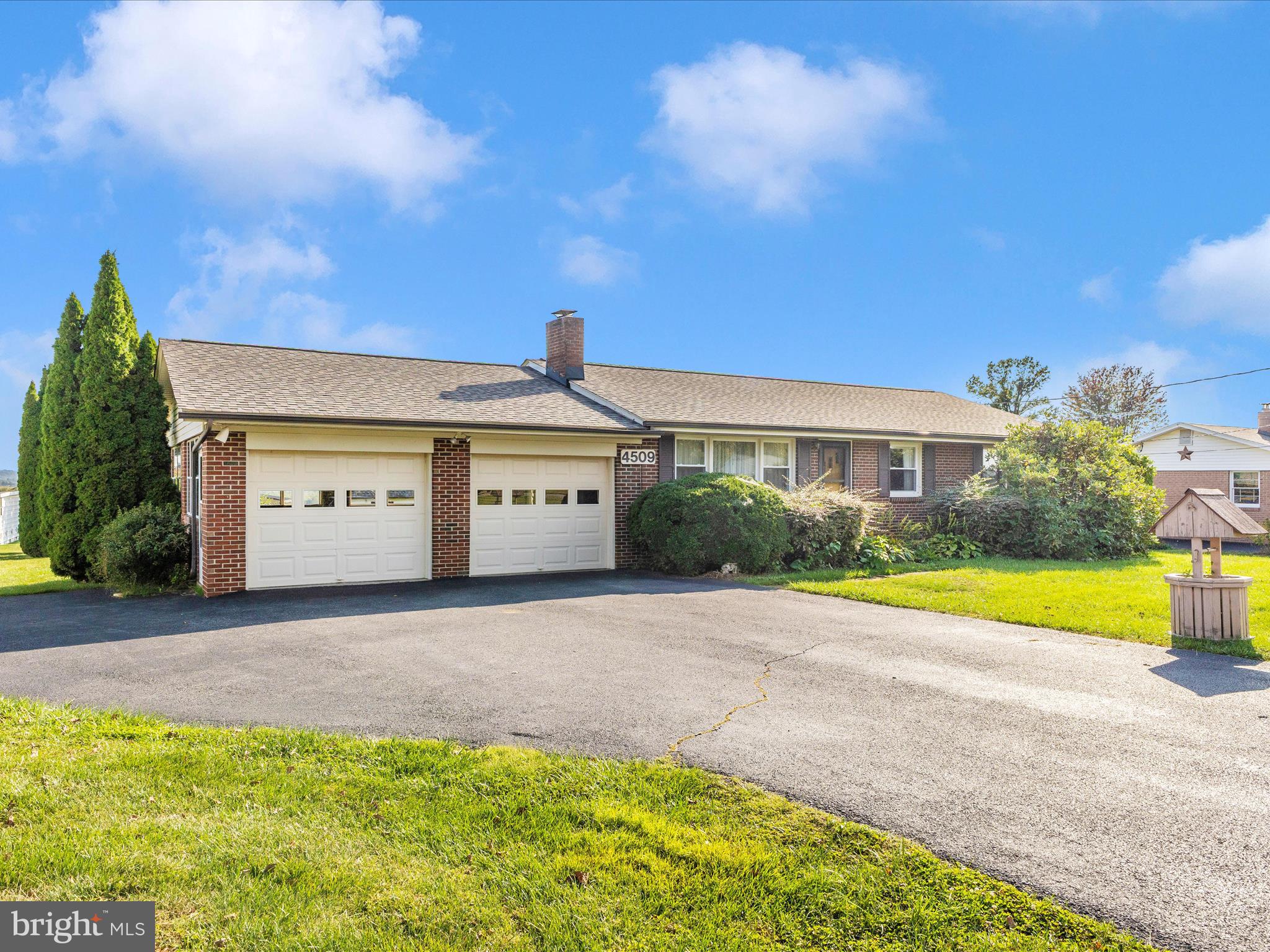 4509 Valley View Road Middletown, MD 21769 - Photo 50 of 51 a front view of a house with a yard and garage