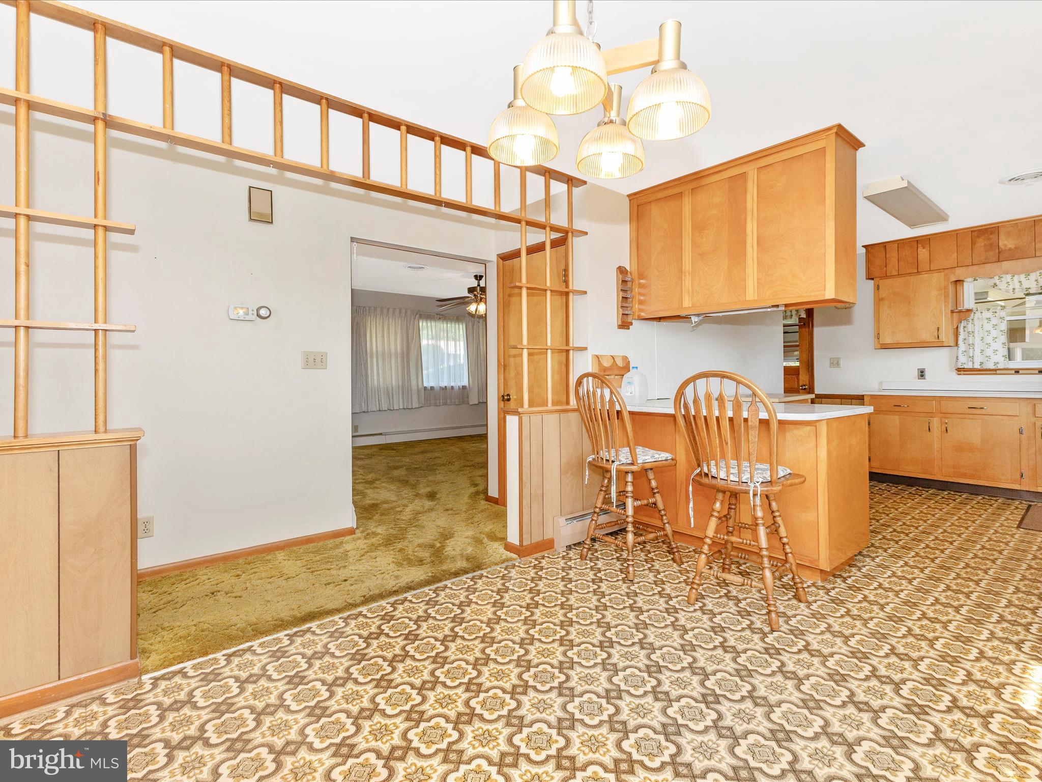 4509 Valley View Road Middletown, MD 21769 - Photo 10 of 51 a large kitchen with a table and chairs