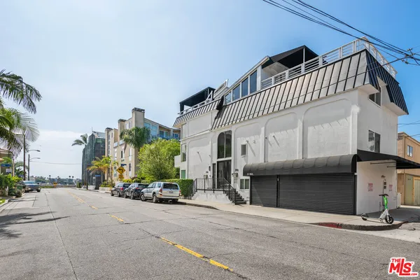 a view of a house with a street