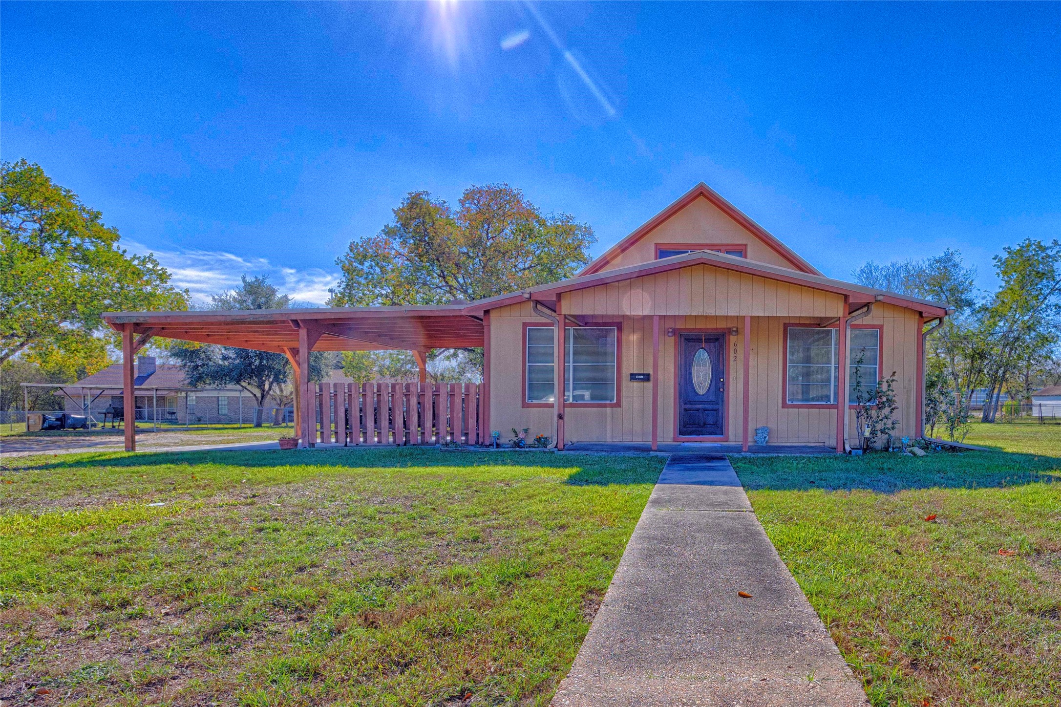 602 East Post Office Street Weimar, TX 78962 - Photo 1 of 21 a front view of a house with a yard