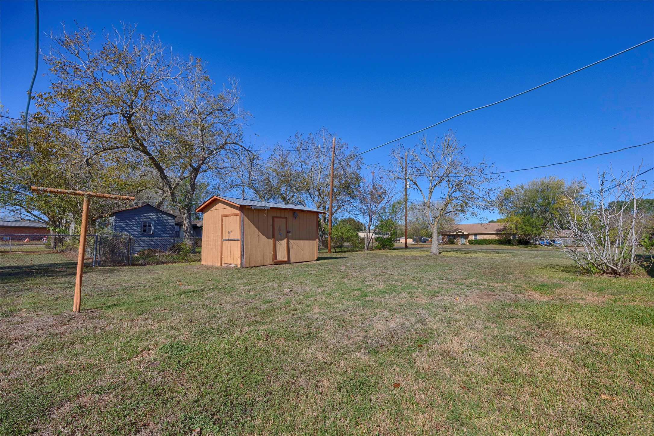 602 East Post Office Street Weimar, TX 78962 - Photo 13 of 21 a view of a house with a yard