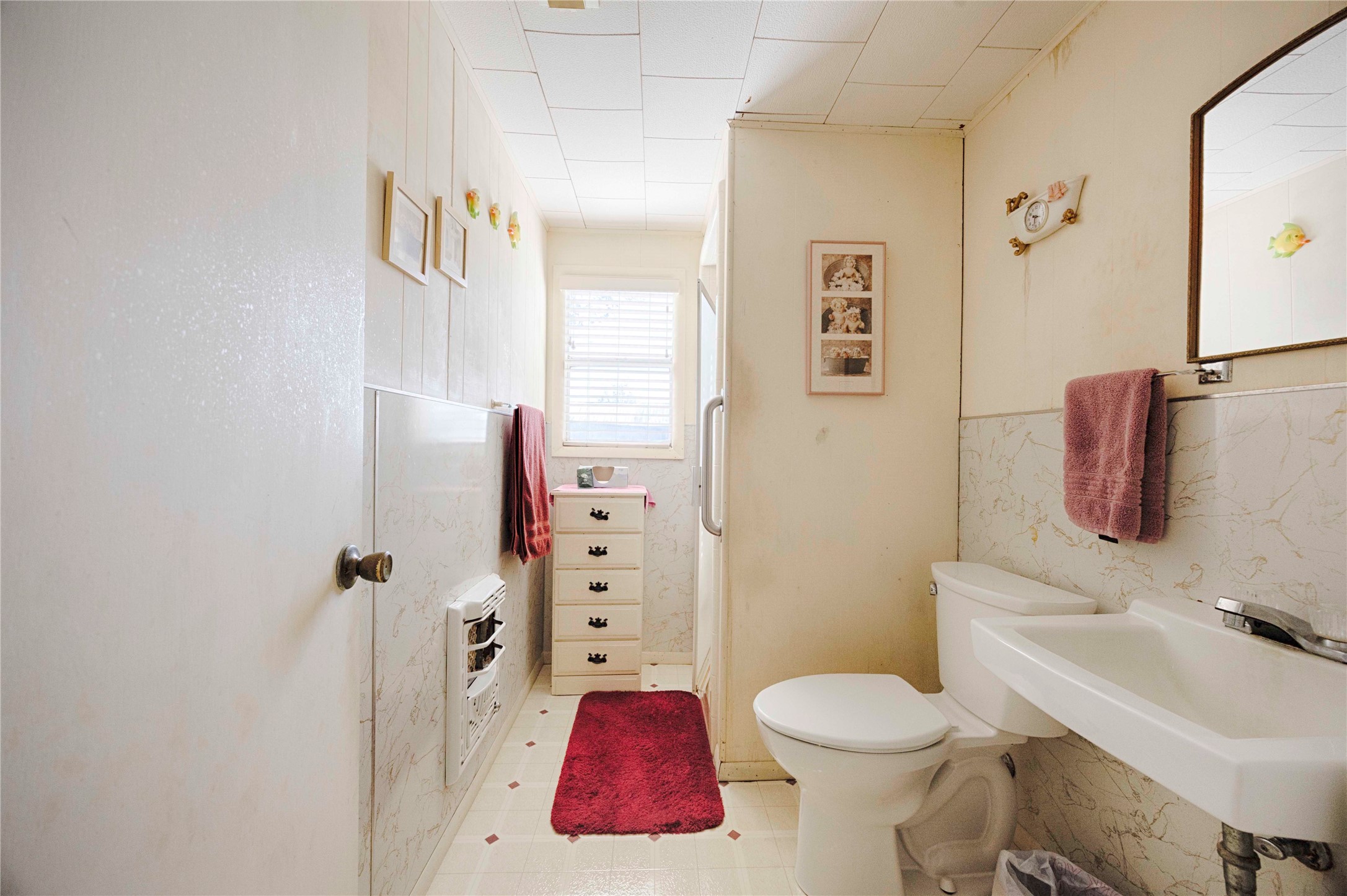 602 East Post Office Street Weimar, TX 78962 - Photo 15 of 21 a bathroom with a sink toilet and shower