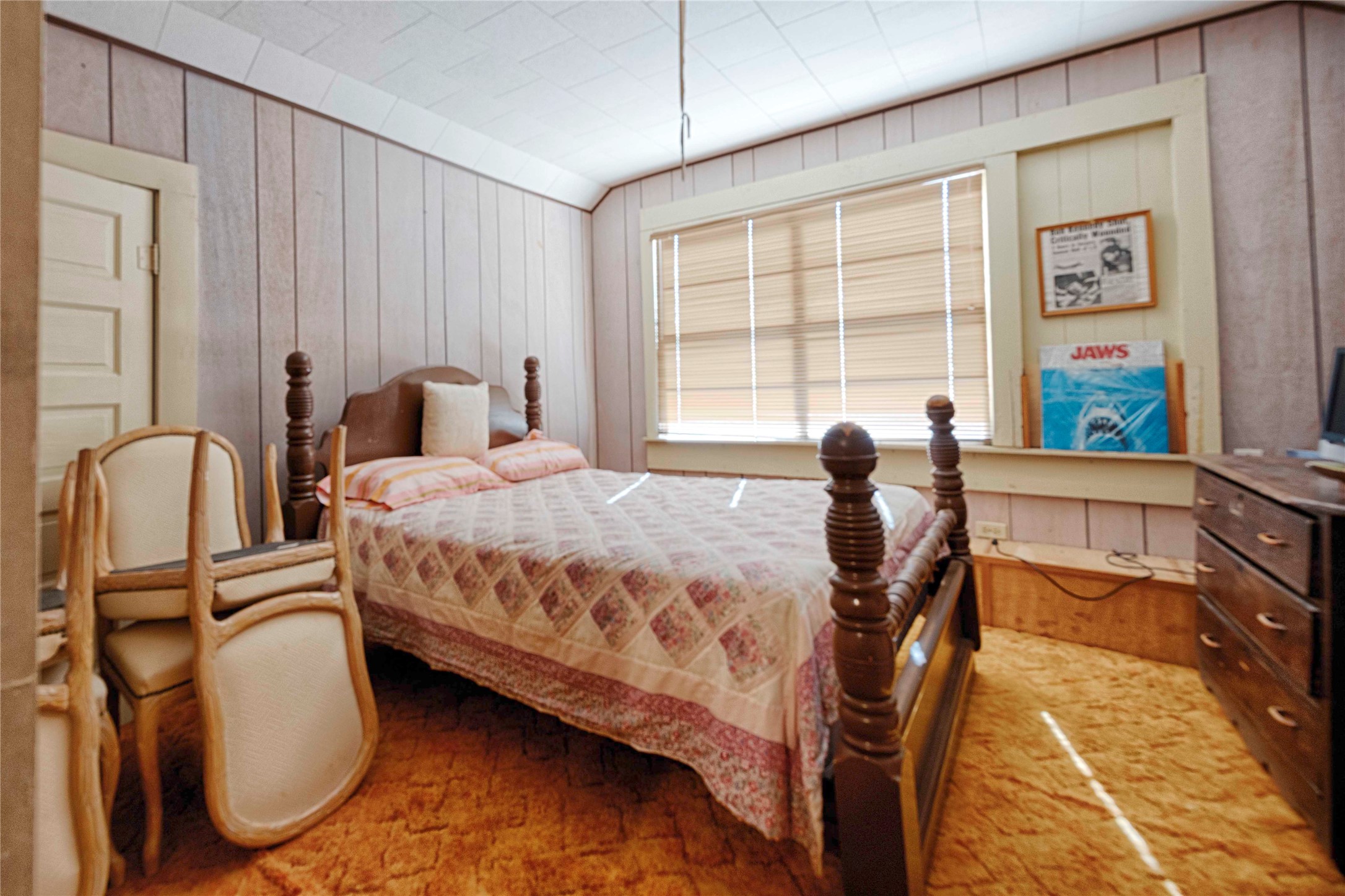 602 East Post Office Street Weimar, TX 78962 - Photo 20 of 21 a bedroom with a bed chair and window