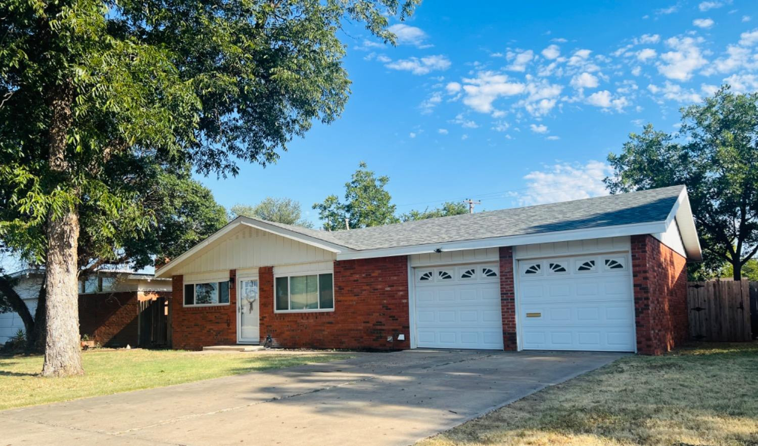 2107 57th Street Lubbock, TX 79412 - Photo 1 of 11 a view of a house with a yard