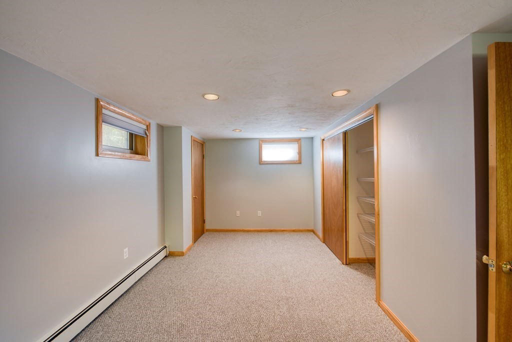 46 Prospect Street Sherborn, MA 01770 - Photo 19 of 40 a view of livingroom with hardwood floor and window