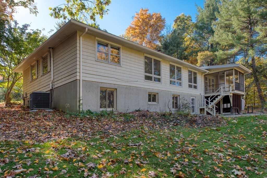 46 Prospect Street Sherborn, MA 01770 - Photo 31 of 40 a front view of a house with garden