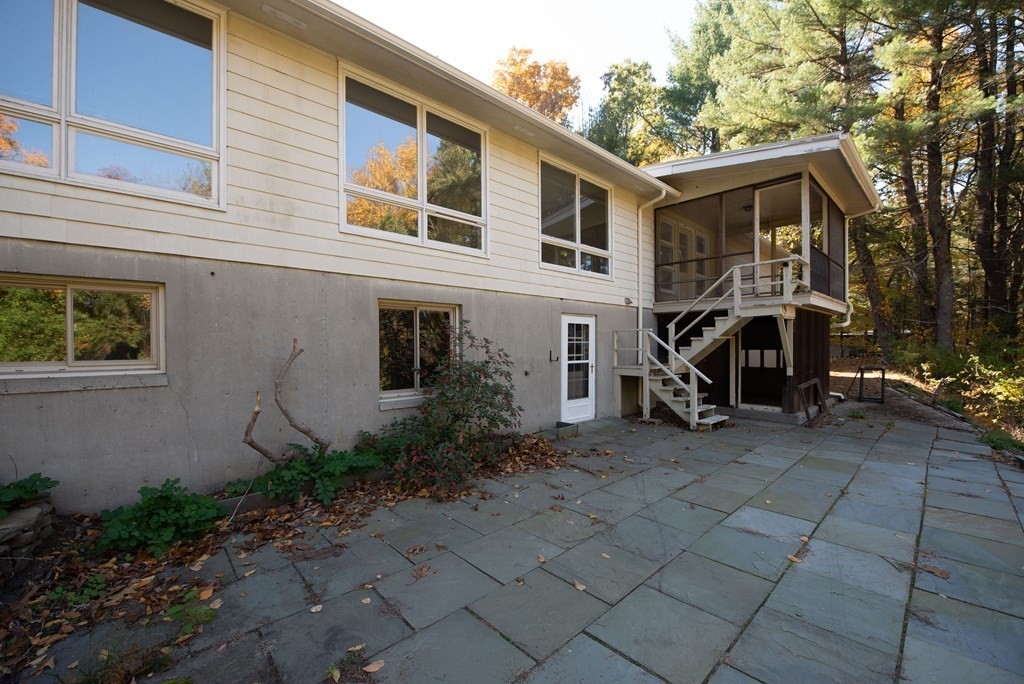 46 Prospect Street Sherborn, MA 01770 - Photo 32 of 40 a view of a house with backyard and sitting area