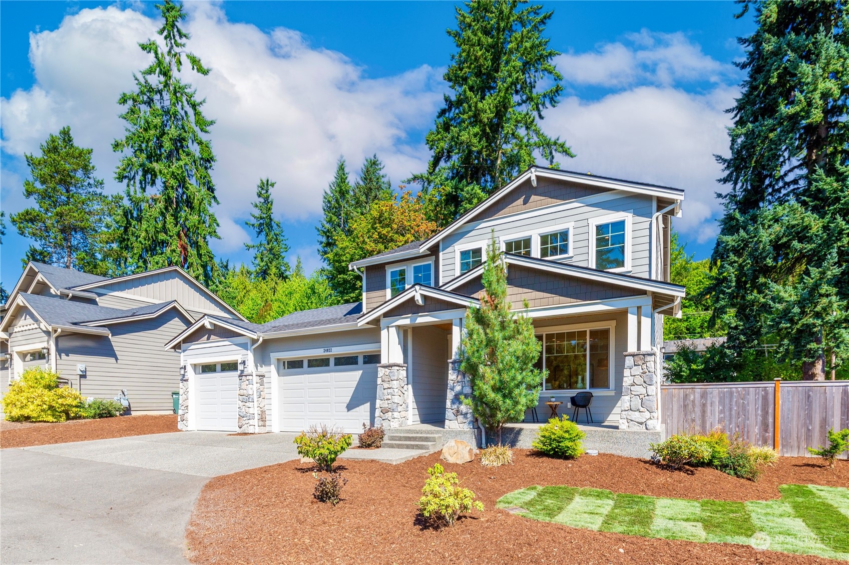 24022 Meridian Avenue South Bothell, WA 98021 - Photo 1 of 36 a front view of a house with garden