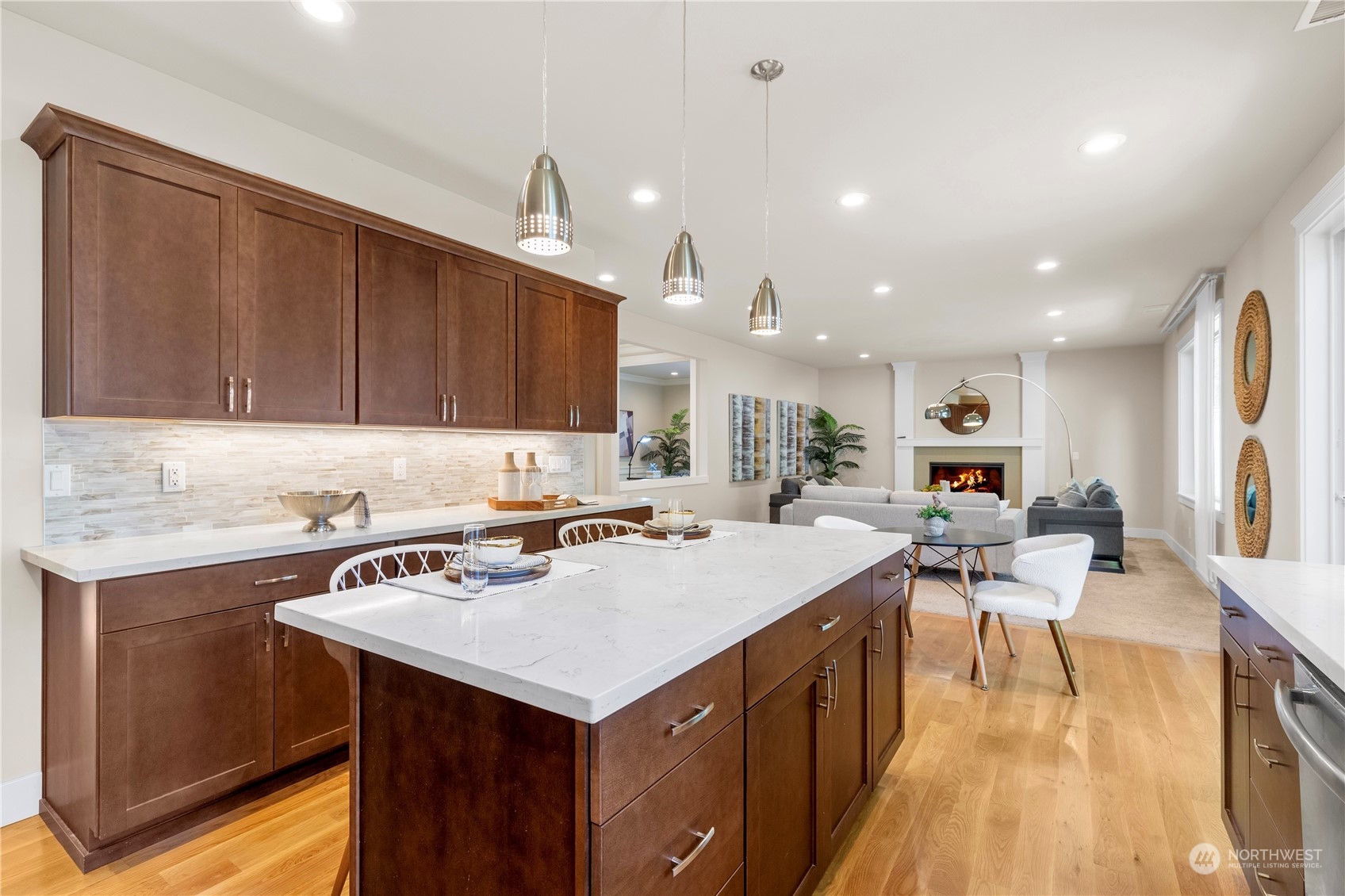 24022 Meridian Avenue South Bothell, WA 98021 - Photo 17 of 36 a kitchen with a sink a counter top space and stainless steel appliances