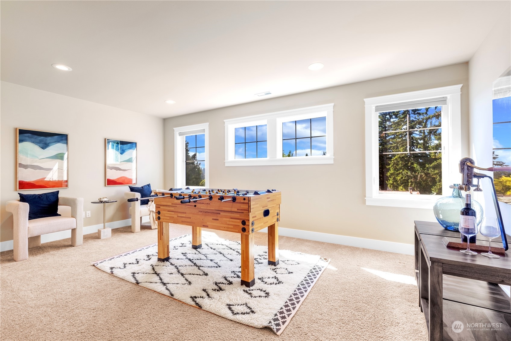 24022 Meridian Avenue South Bothell, WA 98021 - Photo 19 of 36 a living room with furniture a rug and a window