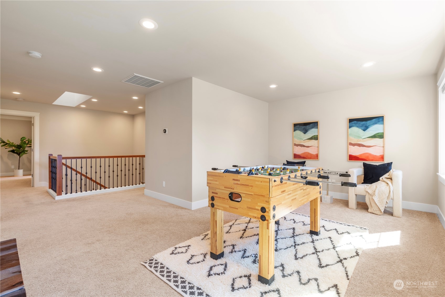 24022 Meridian Avenue South Bothell, WA 98021 - Photo 20 of 36 a living room with furniture a table and kitchen view