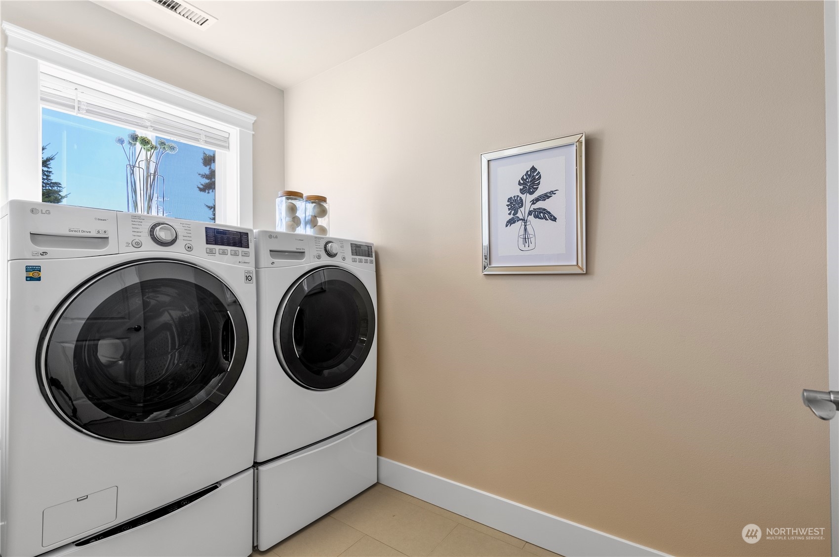 24022 Meridian Avenue South Bothell, WA 98021 - Photo 22 of 36 a utility room with dryer and washer
