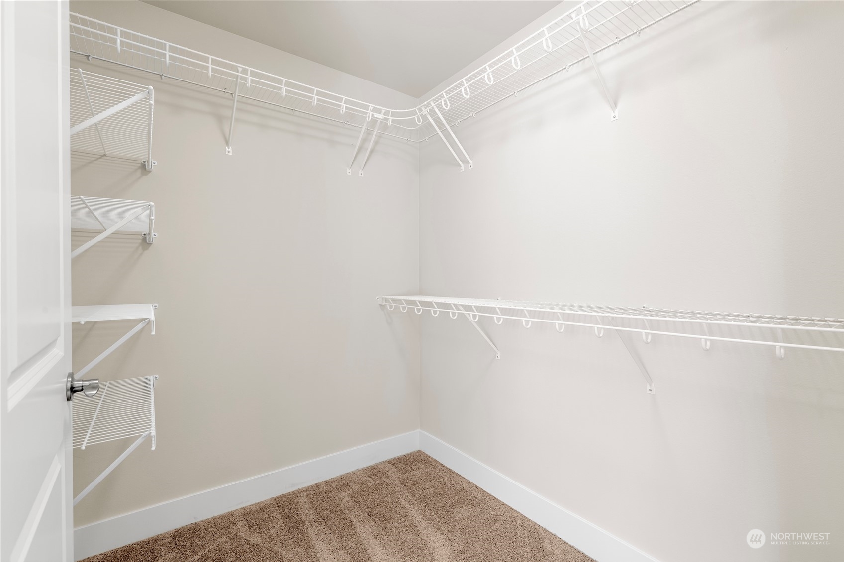 24022 Meridian Avenue South Bothell, WA 98021 - Photo 31 of 36 a view of a room with racks on the wall