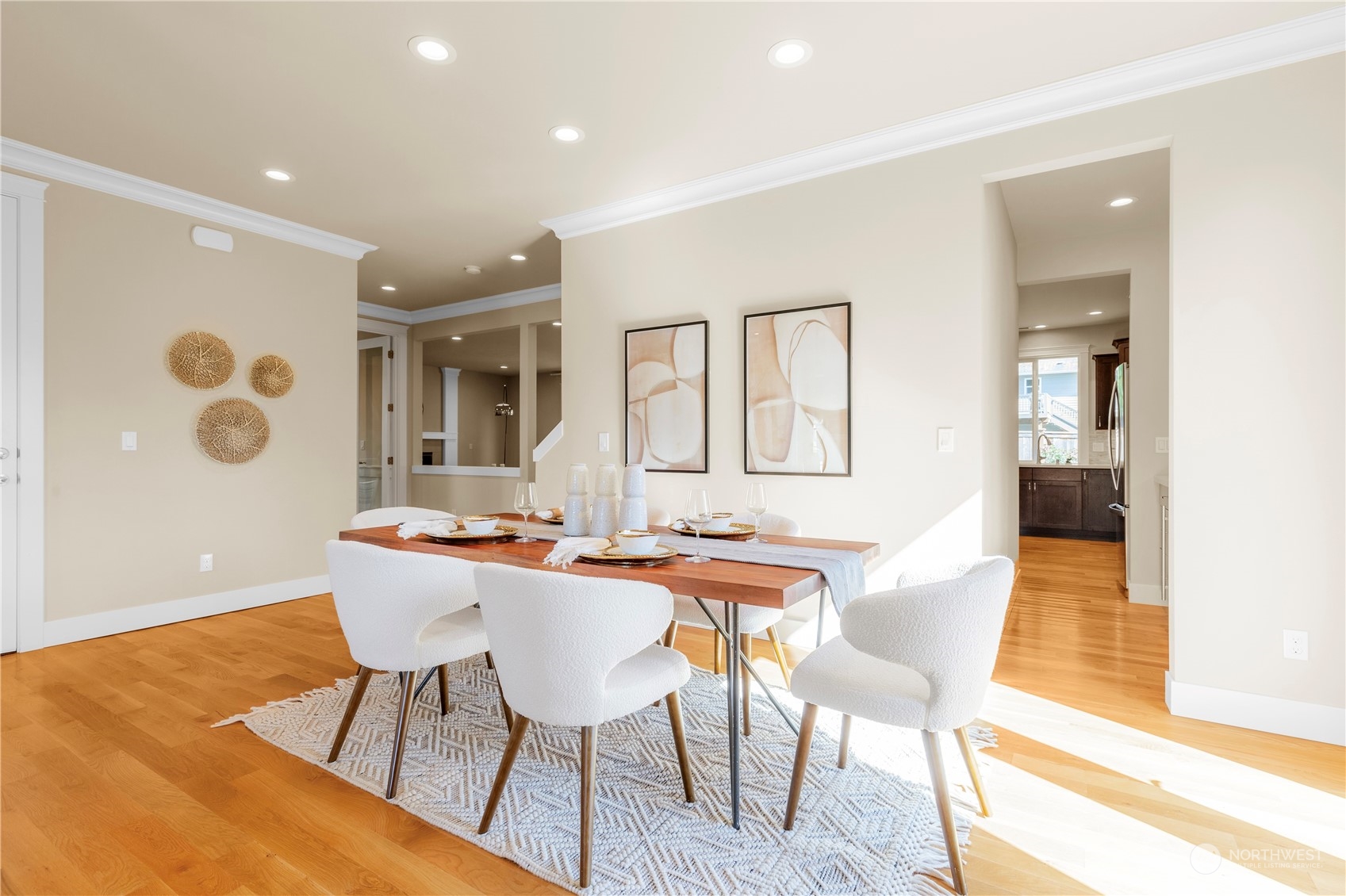 24022 Meridian Avenue South Bothell, WA 98021 - Photo 6 of 36 a view of a dining room with furniture and wooden floor