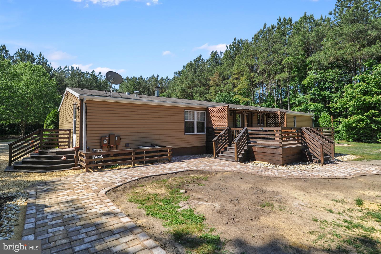 14443 Shiloh Church Road Laurel, DE 19956 - Photo 4 of 37 Back Deck and pavers to firepit and grills