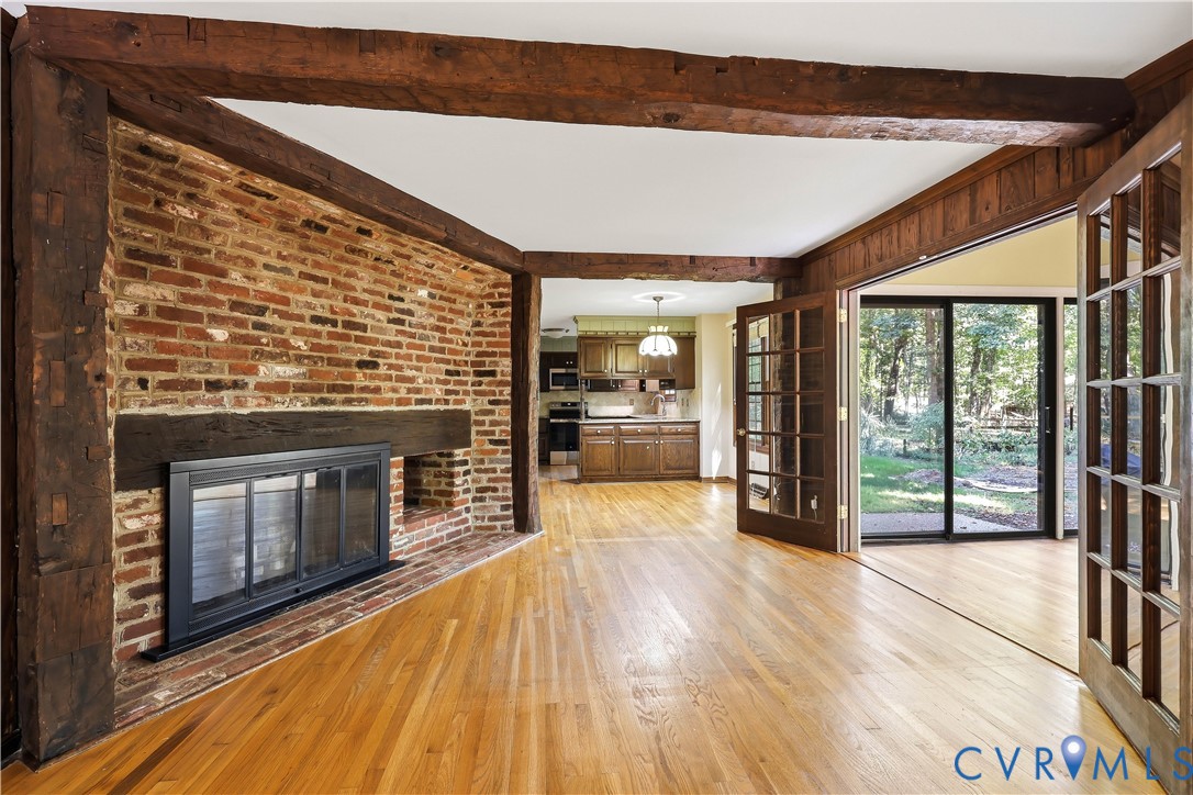 2725 Queenswood Road Midlothian, VA 23113 - Photo 5 of 17 Sensational brick wall surrounding fireplace which
