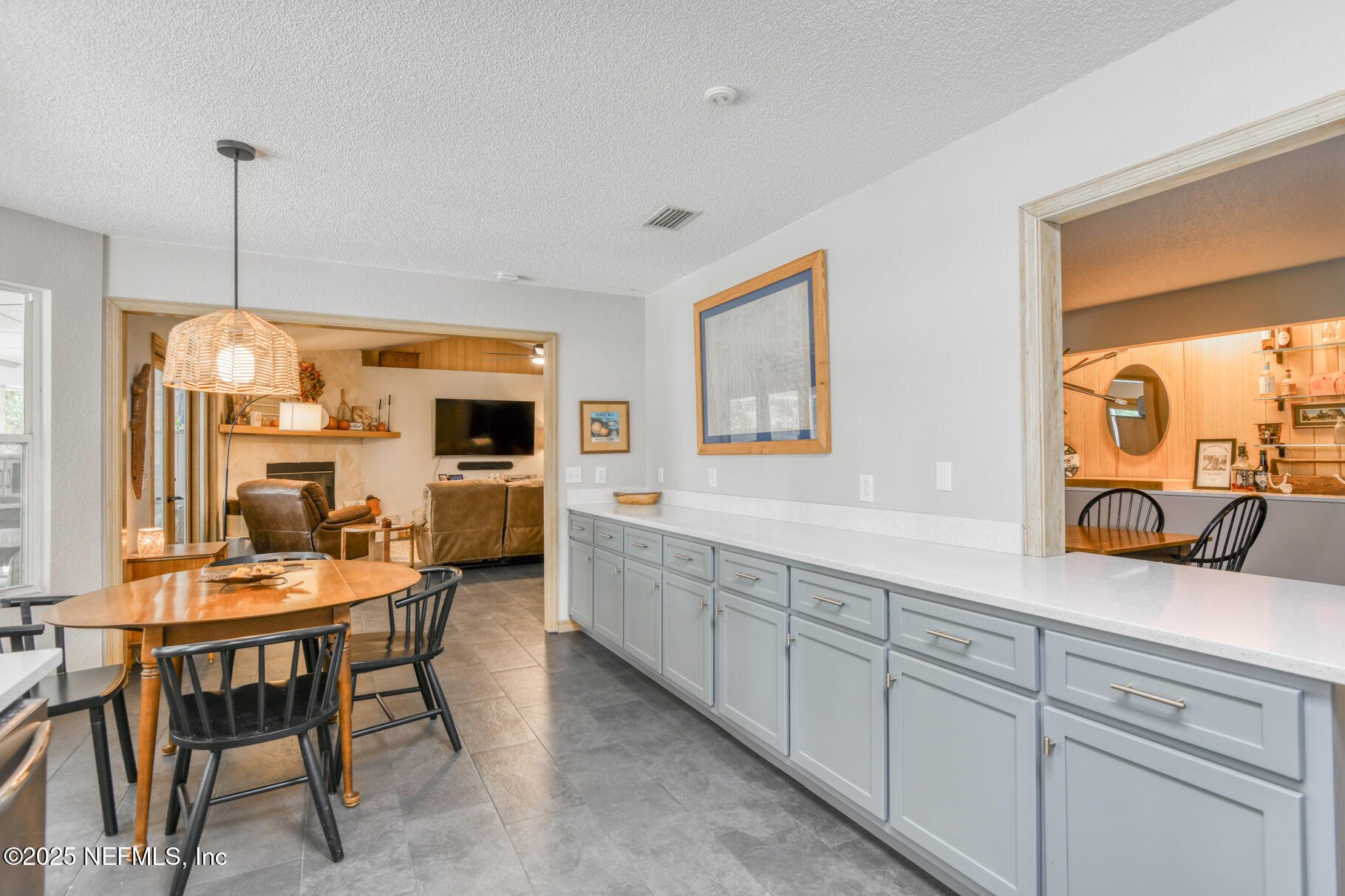 308 Silver Lake Road Palatka, FL 32177 - Photo 15 of 59 kitchen to living and dining pass thru