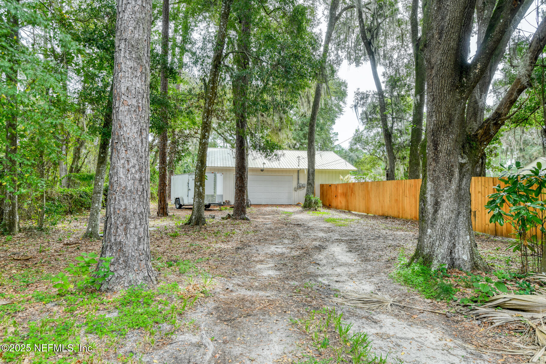 308 Silver Lake Road Palatka, FL 32177 - Photo 42 of 59 back drive to detached garage
