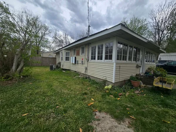 a house that has a lot of plants in it