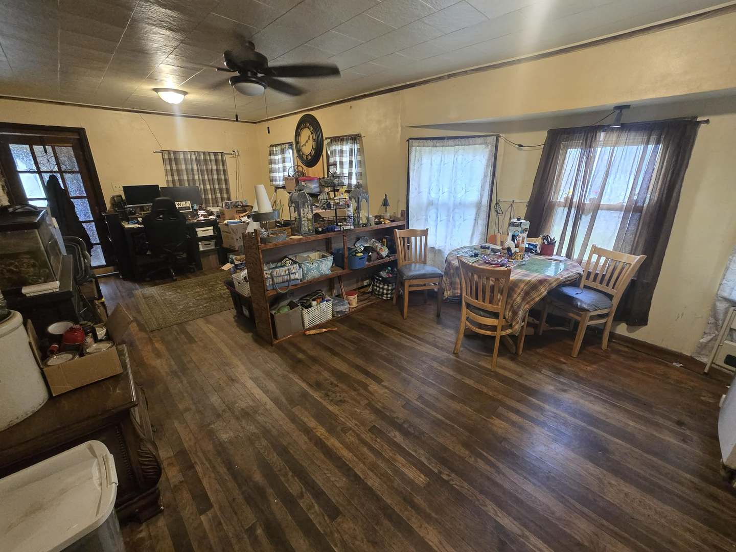 208 West Bryan Street Herrin, IL 62948 - Photo 7 of 27 a living room with furniture and a wooden floor
