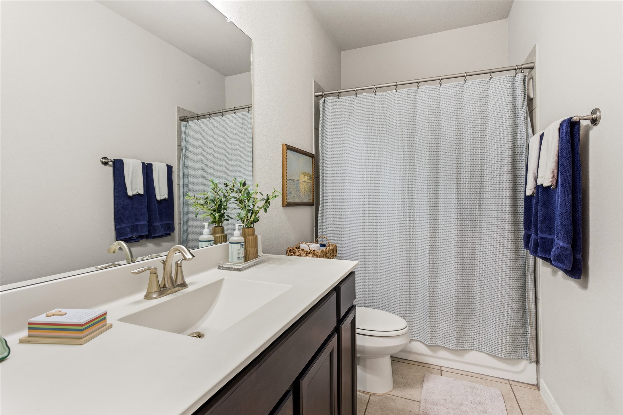 7254 Victorville Drive Rosharon, TX 77583 - Photo 16 of 27 a bathroom with a granite countertop sink toilet and shower