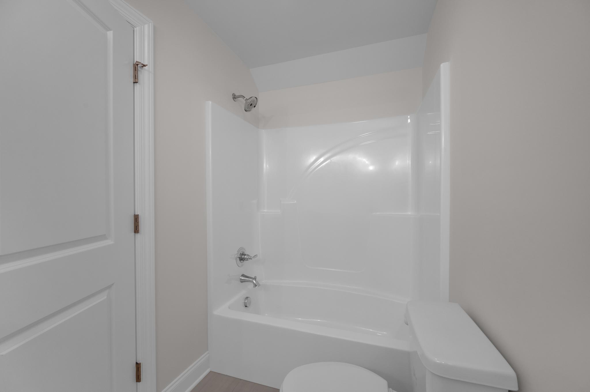 3099 Gwynn Road Lebanon, TN 37090 - Photo 34 of 44 a bathroom with a bathtub and a shower