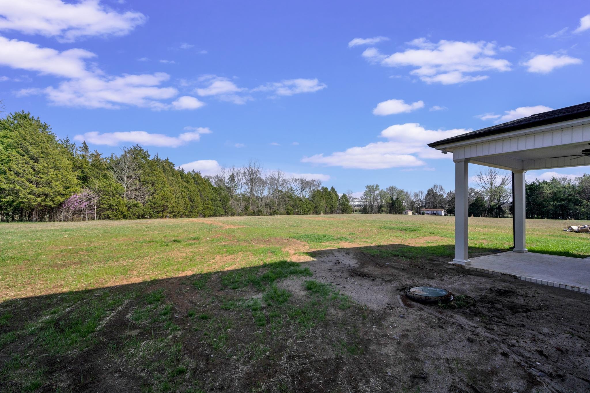 3099 Gwynn Road Lebanon, TN 37090 - Photo 43 of 44 a view of a lake with a yard