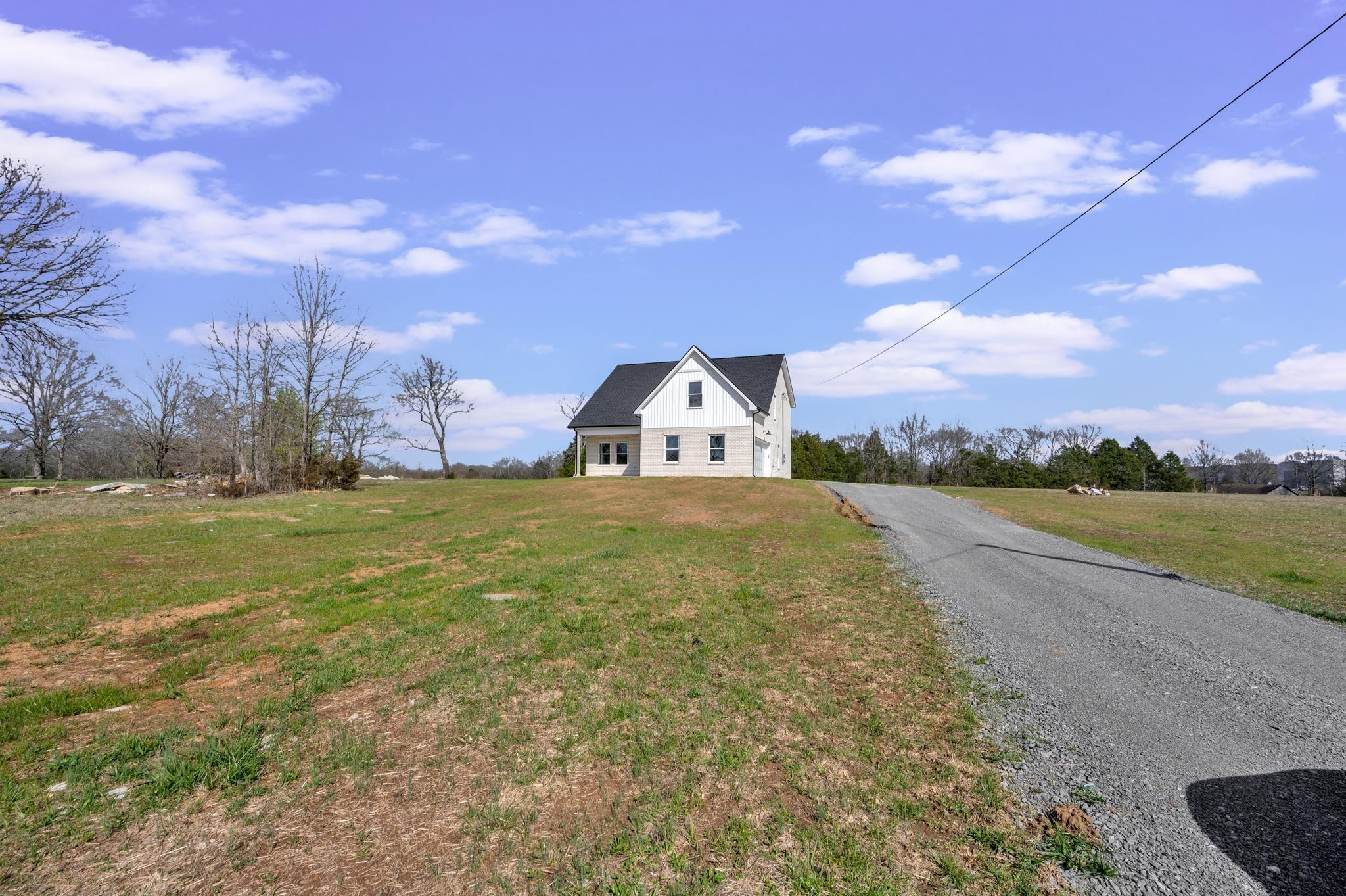 3099 Gwynn Road Lebanon, TN 37090 - Photo 7 of 44 a view of a house with a yard