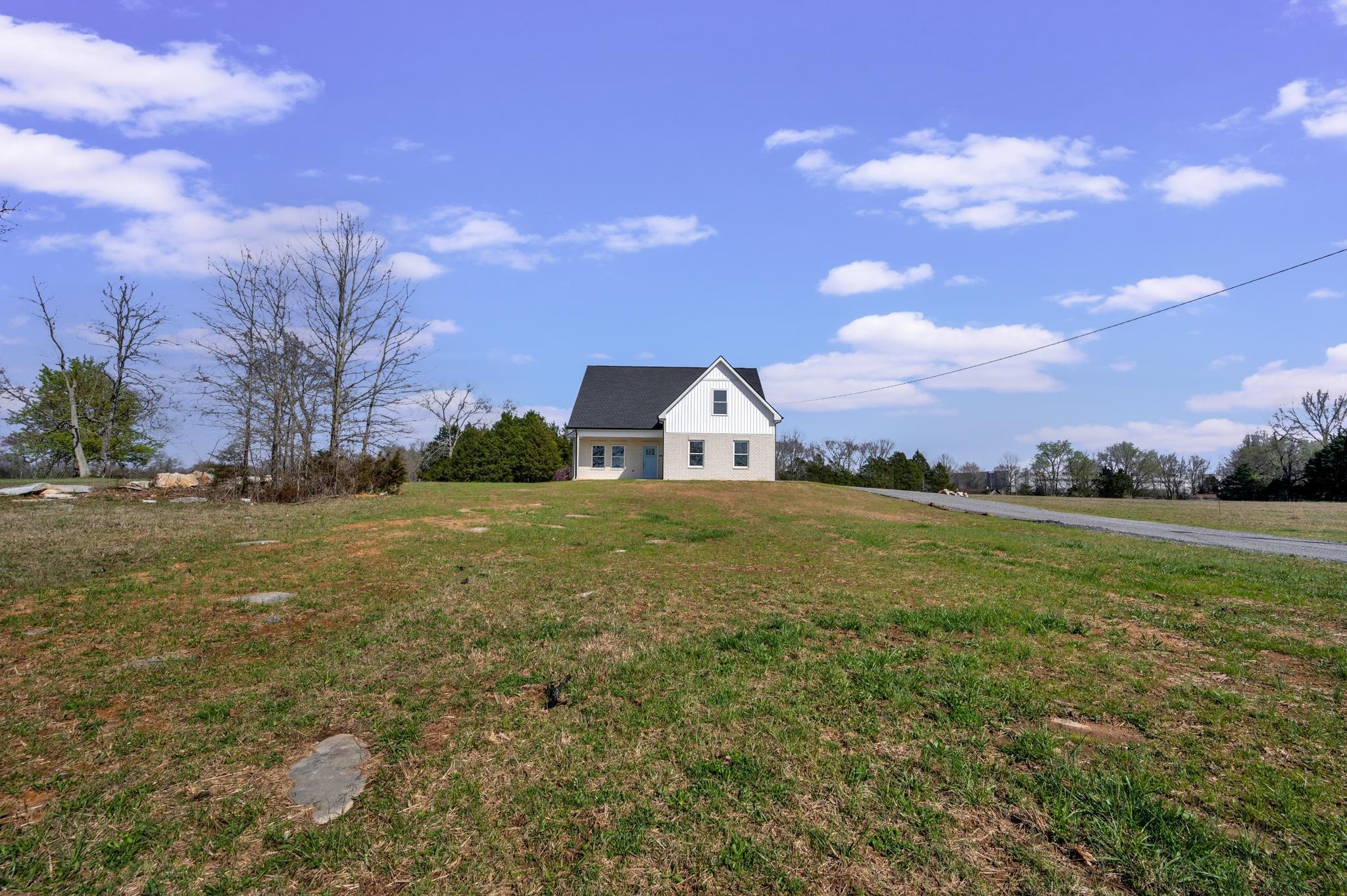 3099 Gwynn Road Lebanon, TN 37090 - Photo 9 of 44 a view of a house with a yard
