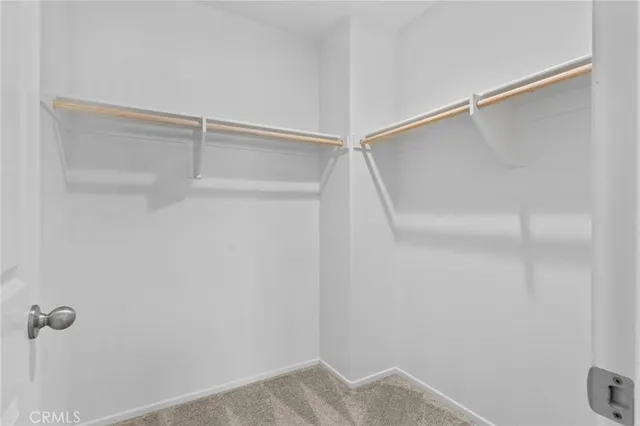 a bathroom with a sink toilet vanity and tub