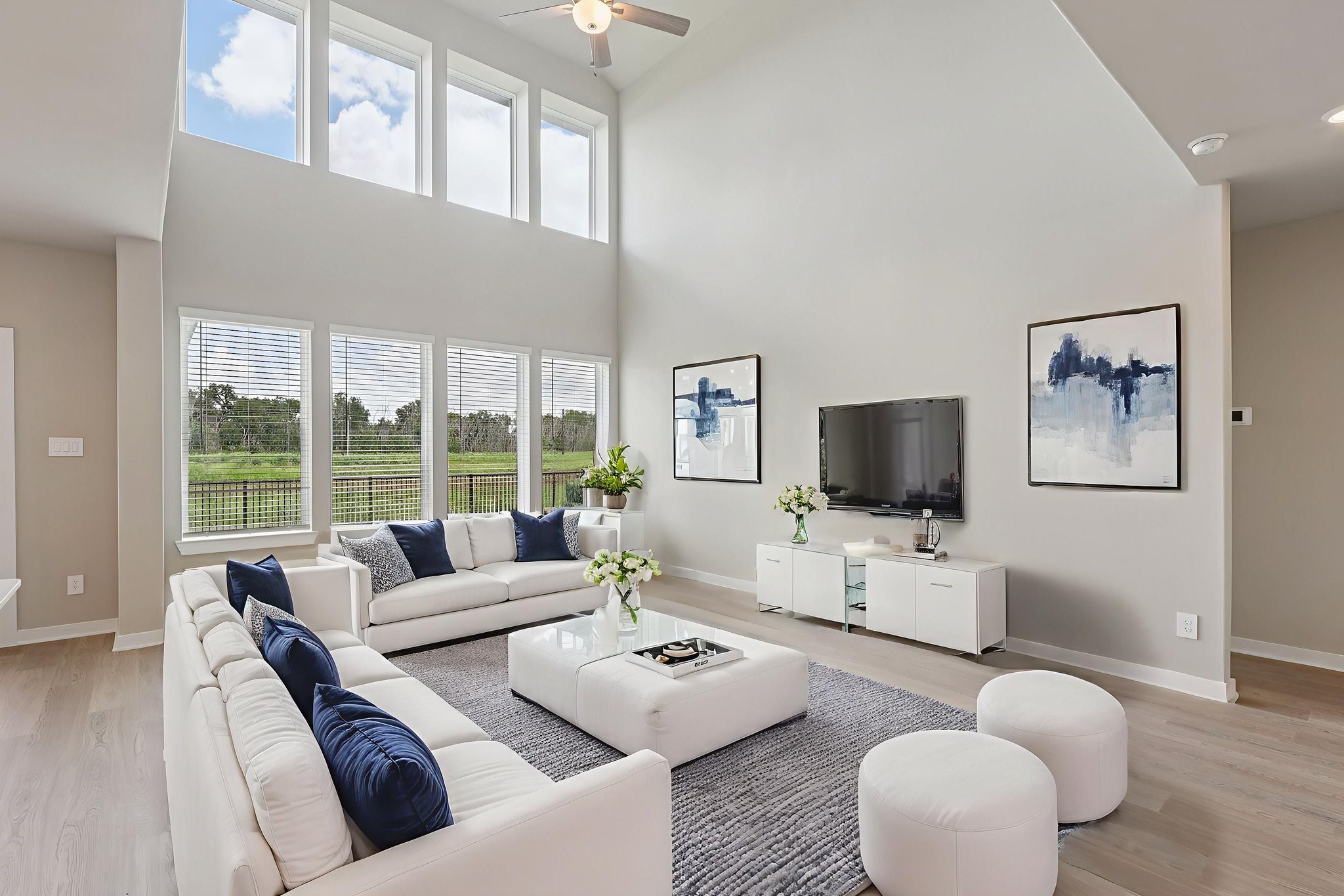 2702 Dark Lantern Drive Rosenberg, TX 77471 - Photo 11 of 39 a living room with furniture and a flat screen tv