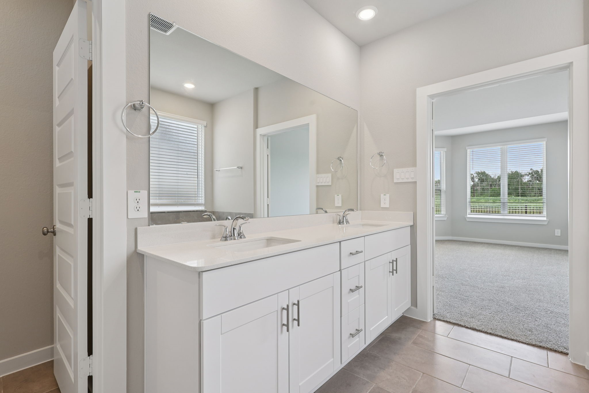 2702 Dark Lantern Drive Rosenberg, TX 77471 - Photo 19 of 39 a bathroom with a sink and a mirror