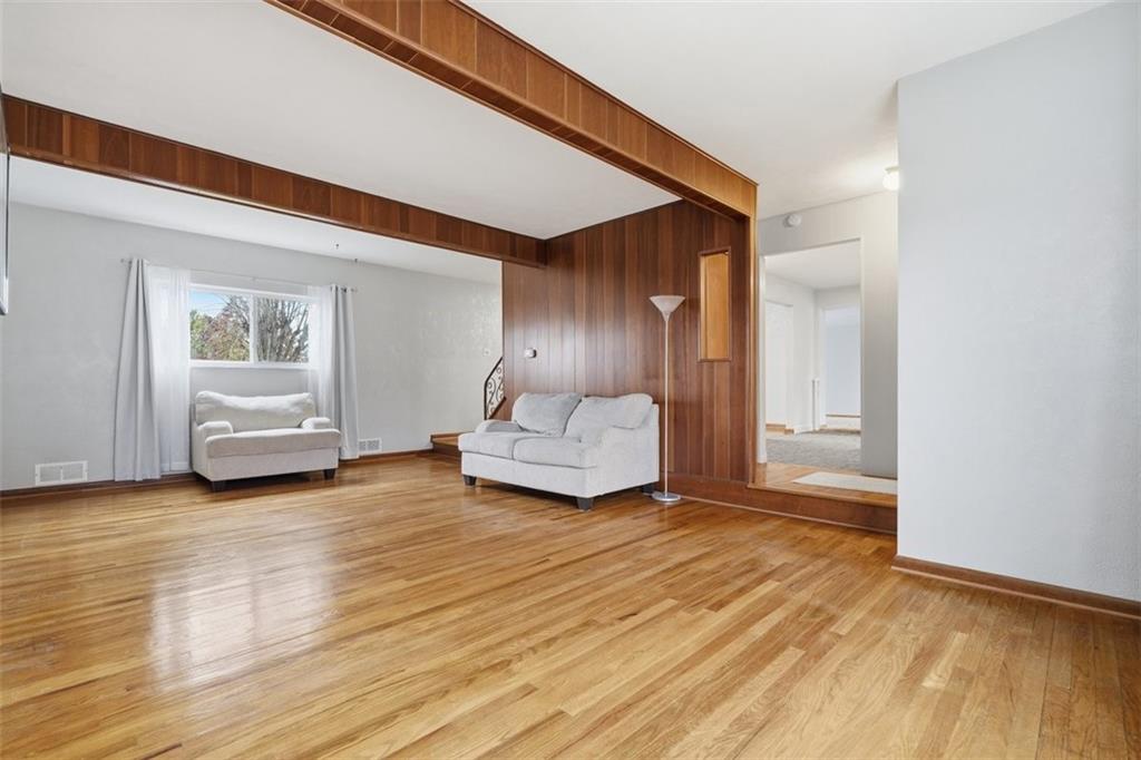 203 Clover Drive Elizabeth, PA 15037 - Photo 8 of 46 a view of a livingroom with furniture and wooden floor