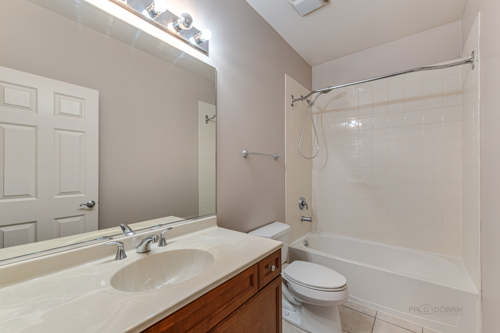 736 West 15th Street Chicago, IL 60607 - Photo 18 of 23 a bathroom with a sink a toilet and shower