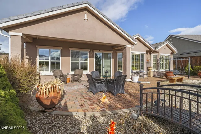 a view of a town with mountains in the background