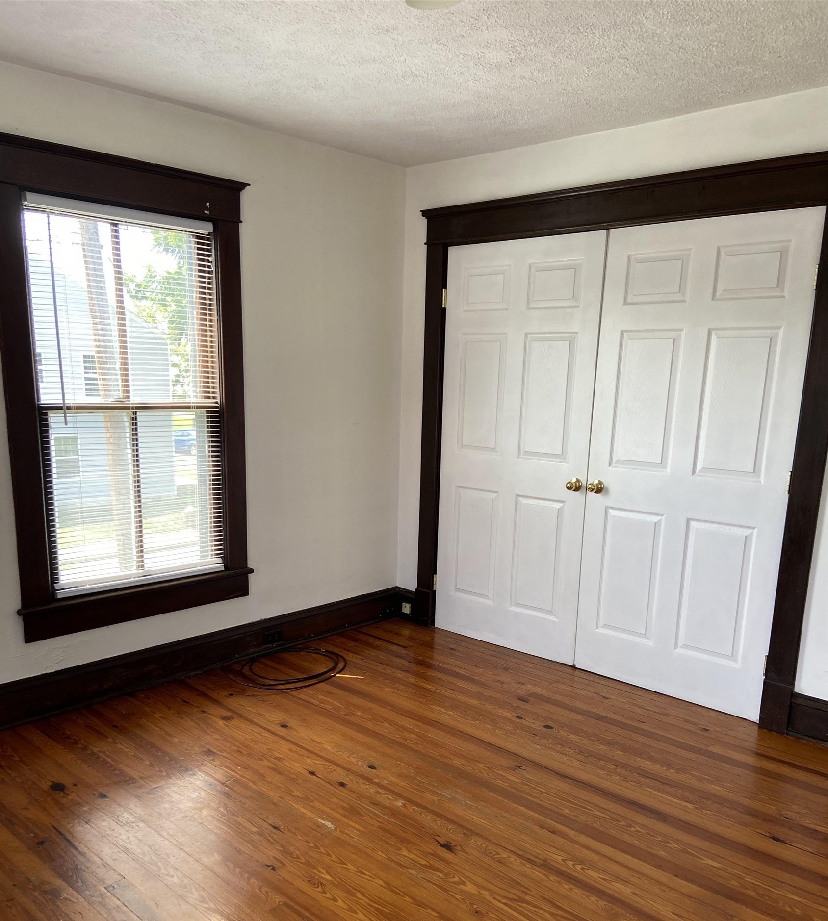 373 South Magnolia Avenue Waynesboro, VA 22980 - Photo 16 of 29 a view of an empty room with wooden floor and a window