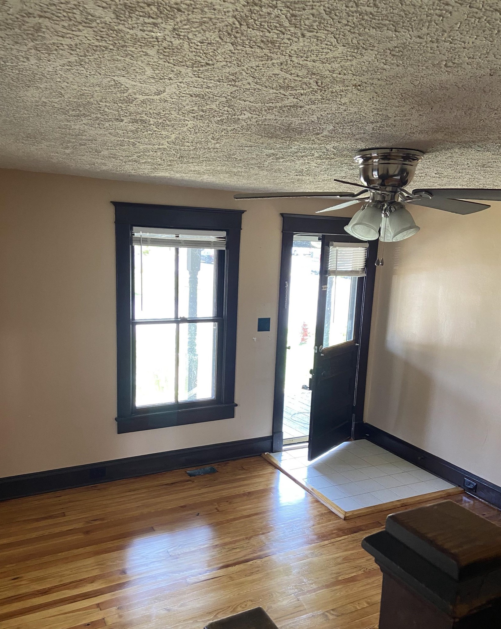 373 South Magnolia Avenue Waynesboro, VA 22980 - Photo 3 of 29 a view of an empty room with wooden floor and a window