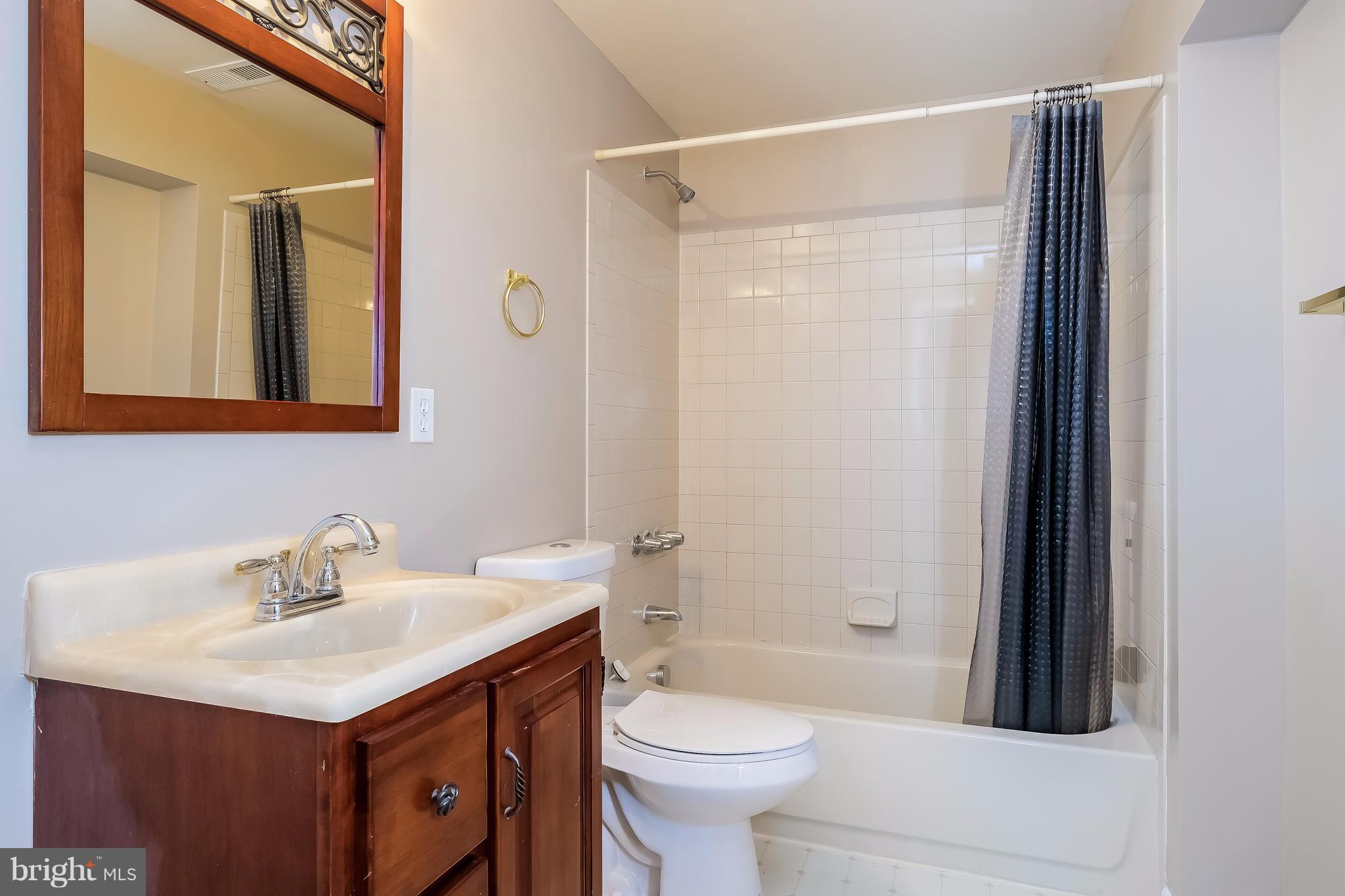 736 Ritchie Avenue Silver Spring, MD 20910 - Photo 21 of 29 a bathroom with a sink toilet and shower