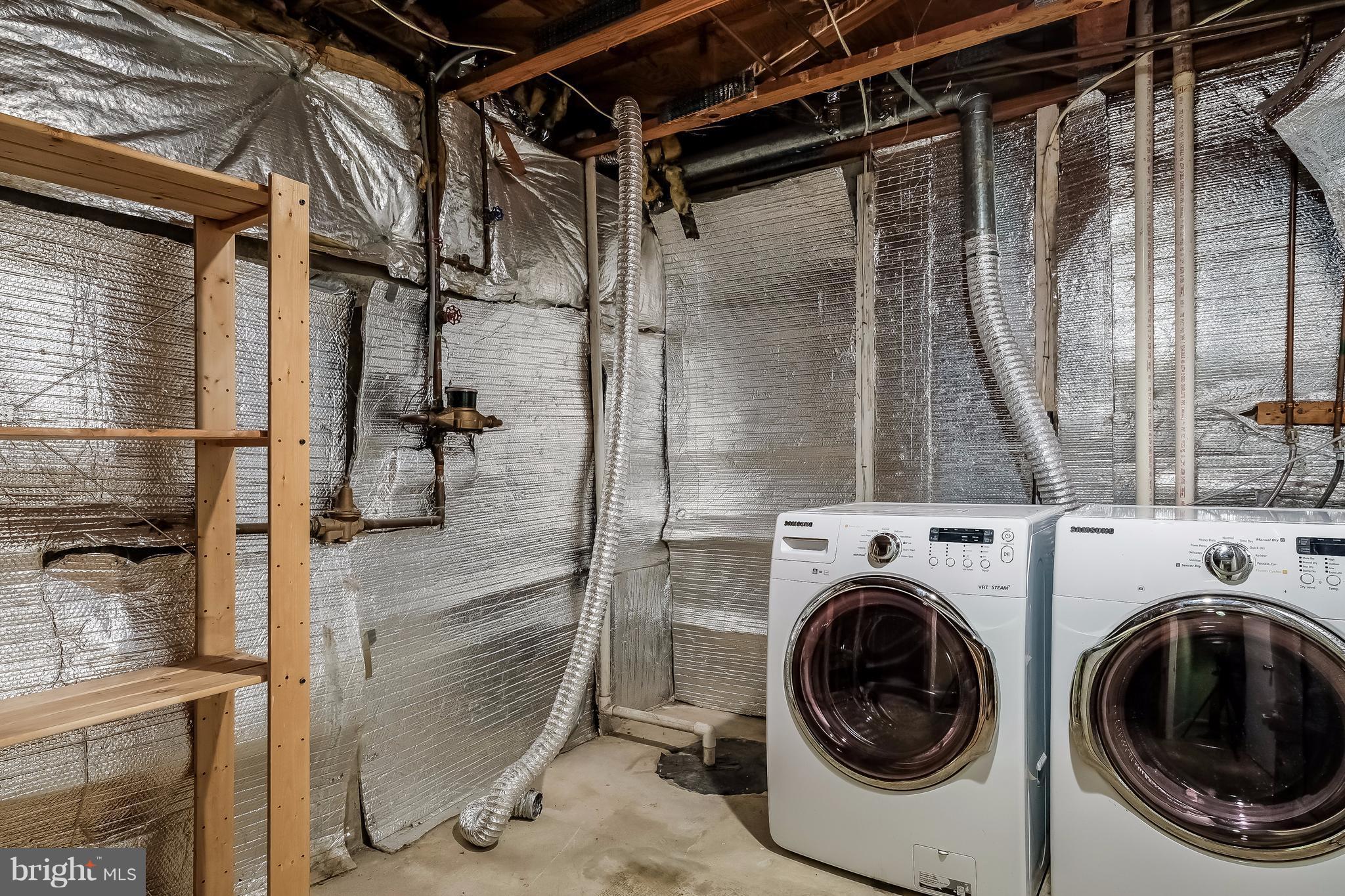 736 Ritchie Avenue Silver Spring, MD 20910 - Photo 22 of 29 a utility room with dryer and washer