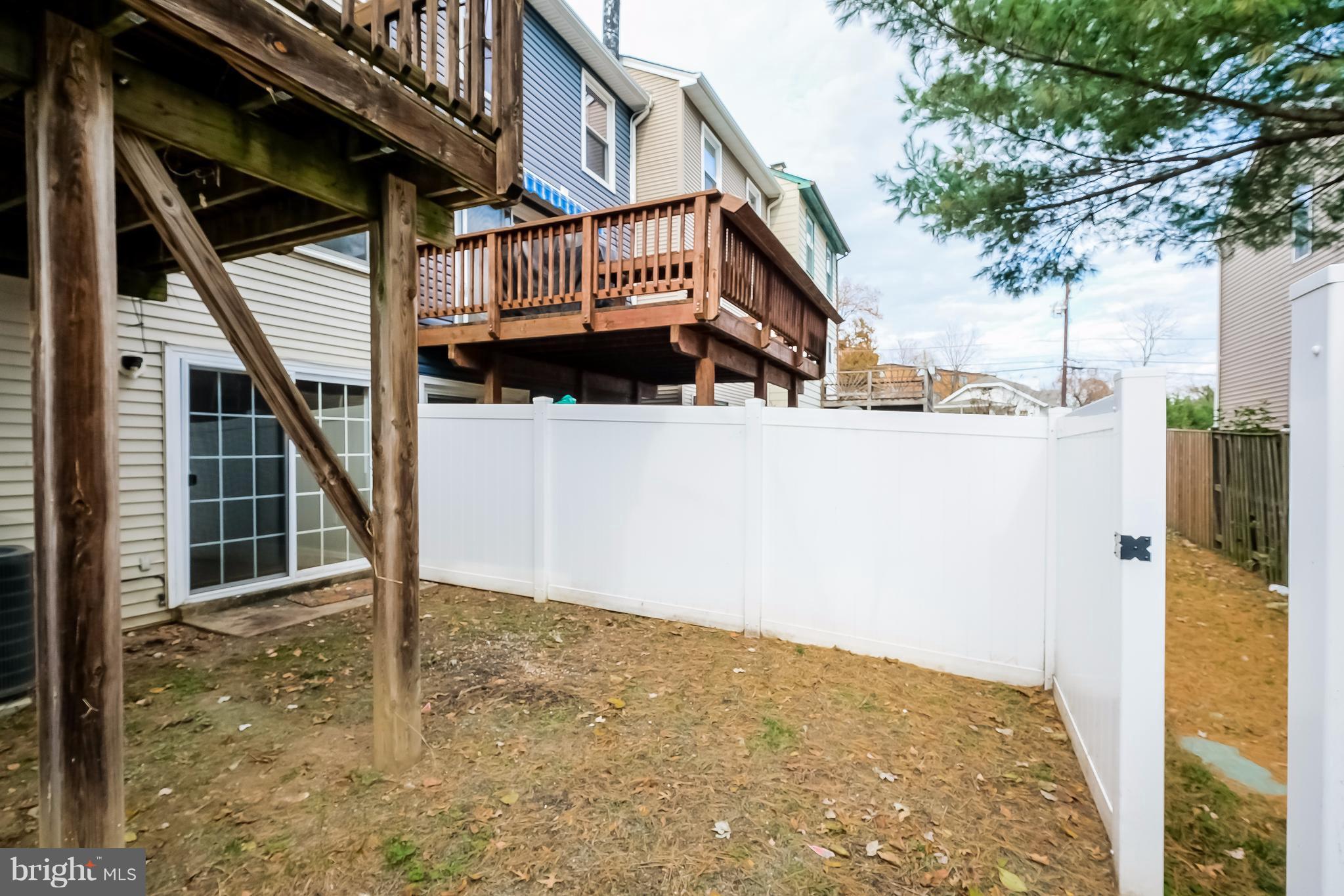 736 Ritchie Avenue Silver Spring, MD 20910 - Photo 26 of 29 a view of a house with a small yard and wooden fence
