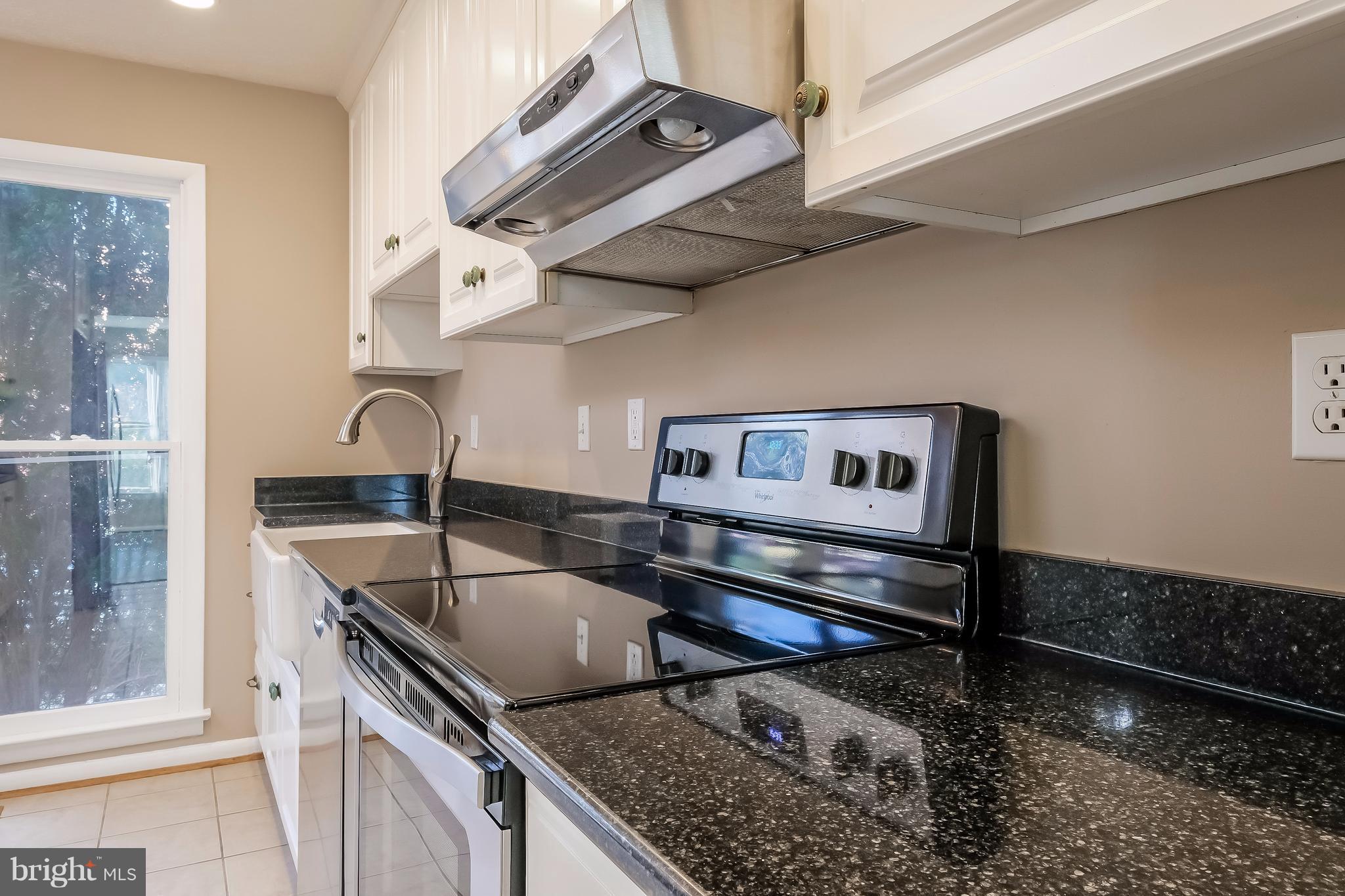 736 Ritchie Avenue Silver Spring, MD 20910 - Photo 7 of 29 a kitchen that has a lot of cabinets in it