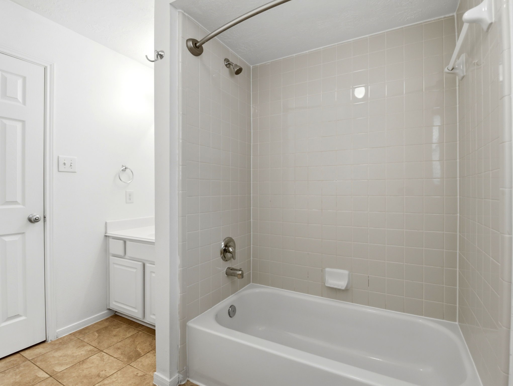 22102 Bridgestone Crossing Drive Spring, TX 77388 - Photo 29 of 38 a bathroom with a bathtub and a shower