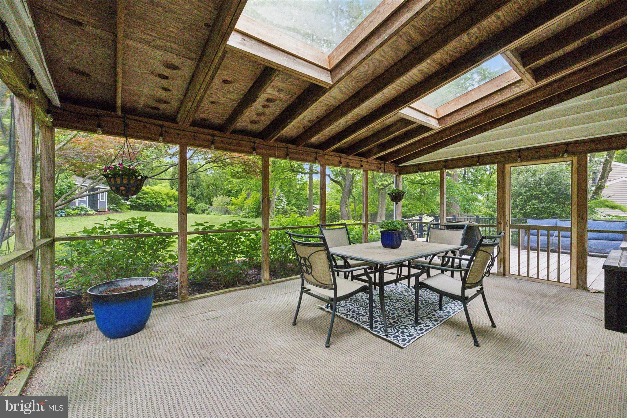 33 Ridge Road Malvern, PA 19355 - Photo 12 of 31 Screened Porch with skylights and door to Deck